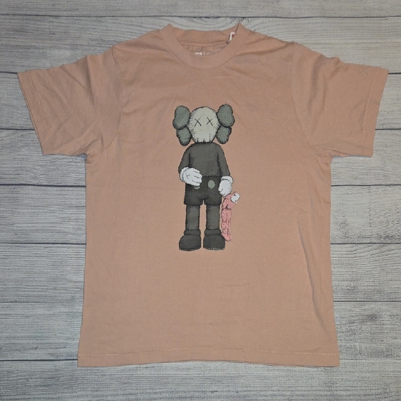 KAWS x Uniqlo Companion T-Shirt Pink Various Sizes NWT - Picture 1 of 13